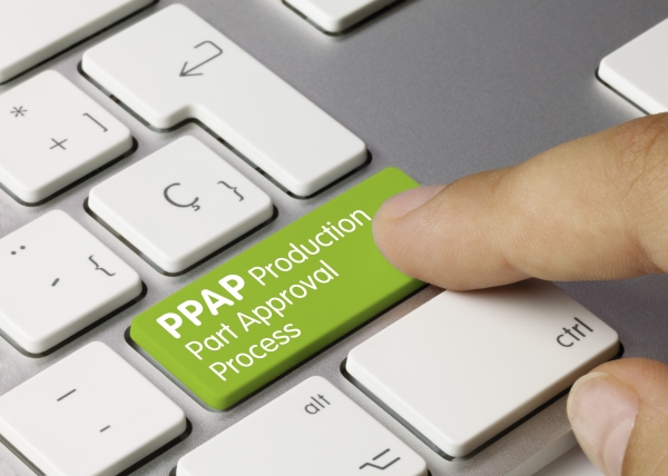 a finger pressing a button on a computer keyboard. the button says "PPAP Production Part Approval Process